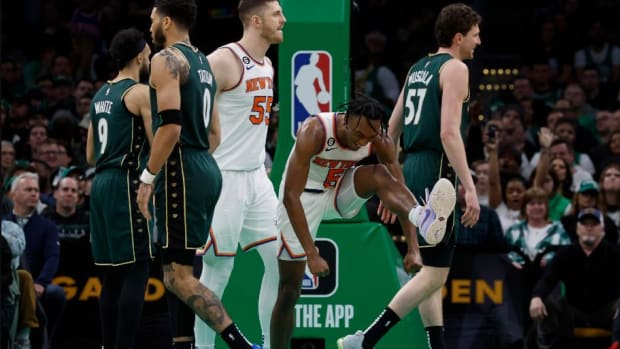 Quickley (2nd from right) celebrates during his 38-point showcase from last season in Boston